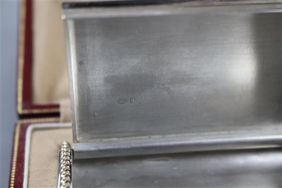 A George VI Cartier silver and yellow metal mounted cigarette case, in original fitted Cartier gilt tooled leather box.